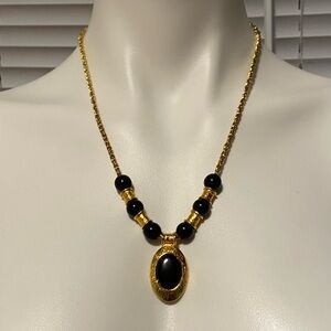 Elegant Gold and Black Necklace